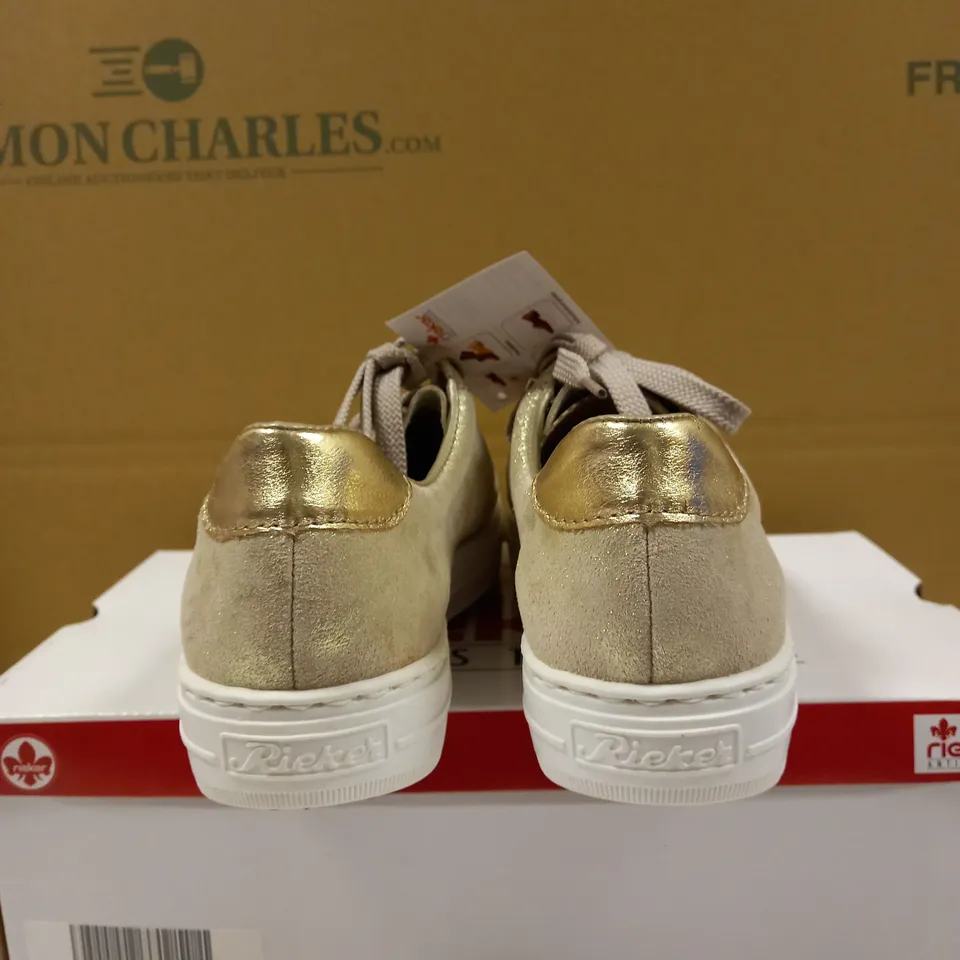 BOXED PAIR OF RIEKER GOLD METALLIC TRAINERS - SIZE 6