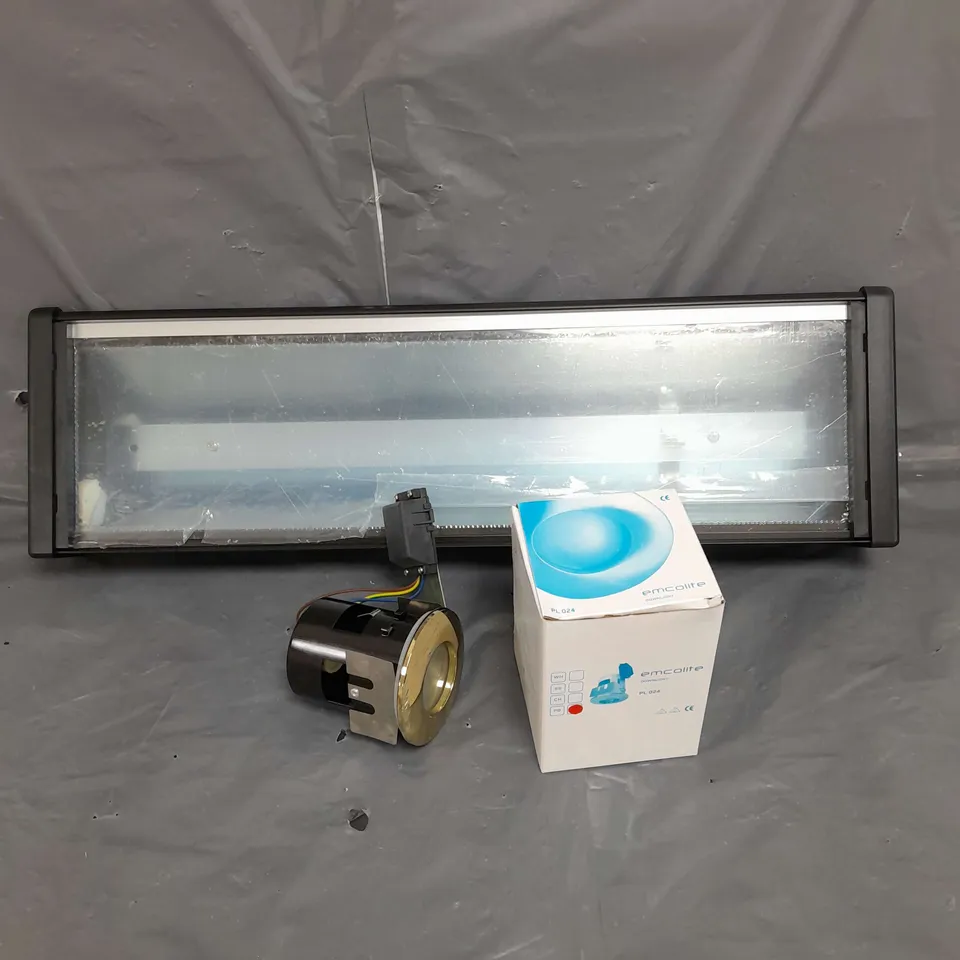 CAGE OF APPROXIMATELY 120 ASSORTED EMCOLITE LIGHTS TO INCLUDE PL 024 DOWNLIGHTS AND IP65 SIGNLIGHTS - COLLECTION ONLY