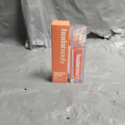 BOXED HUDA BEAUTY FAUX FILLER JELLY LIP OIL IN JUICY PEACH 3.9ML