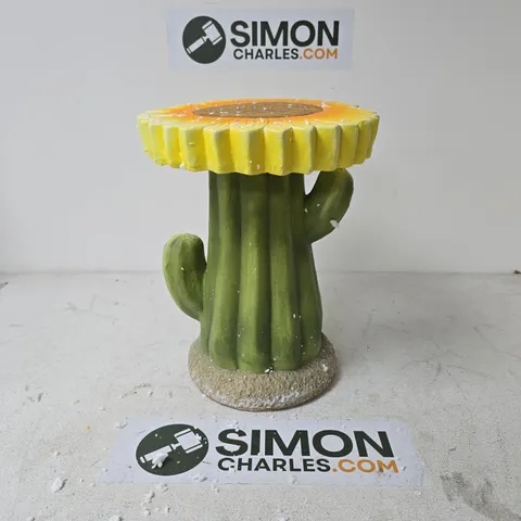 LIVMORE SCULPTURAL RESIN FLOWER CROWN ON A RIBBED SAGUARO CACTUS BASE STOOL