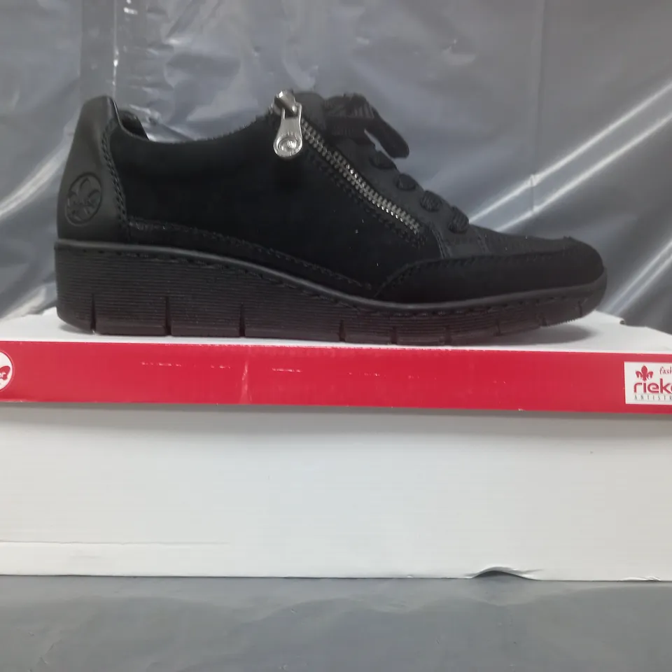 BOXED PAIR OF RIEKER WEDGE TRAINERS IN BLACK SIZE 6