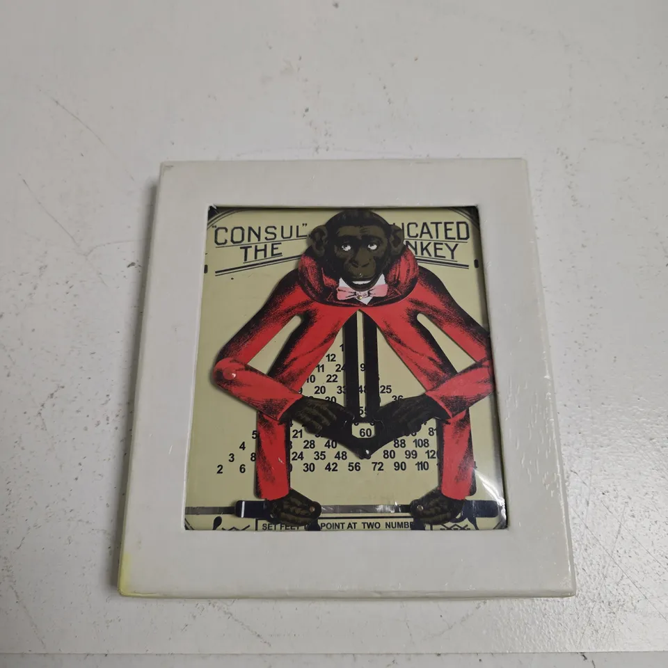 CONSUL 777 CARTOON MONKEY IN RED SUIT WITH NUMERICAL BACKGROUND