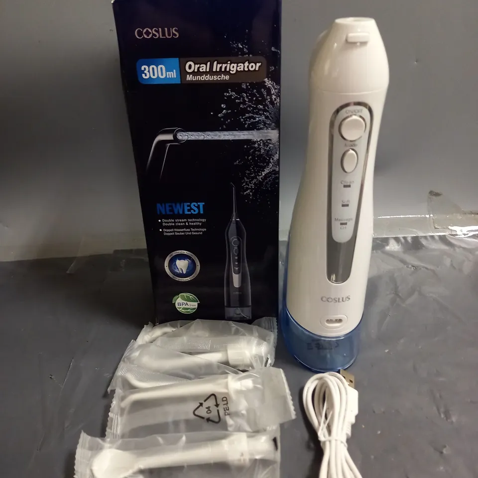 BOXED COSLUS ORAL IRRIGATOR 