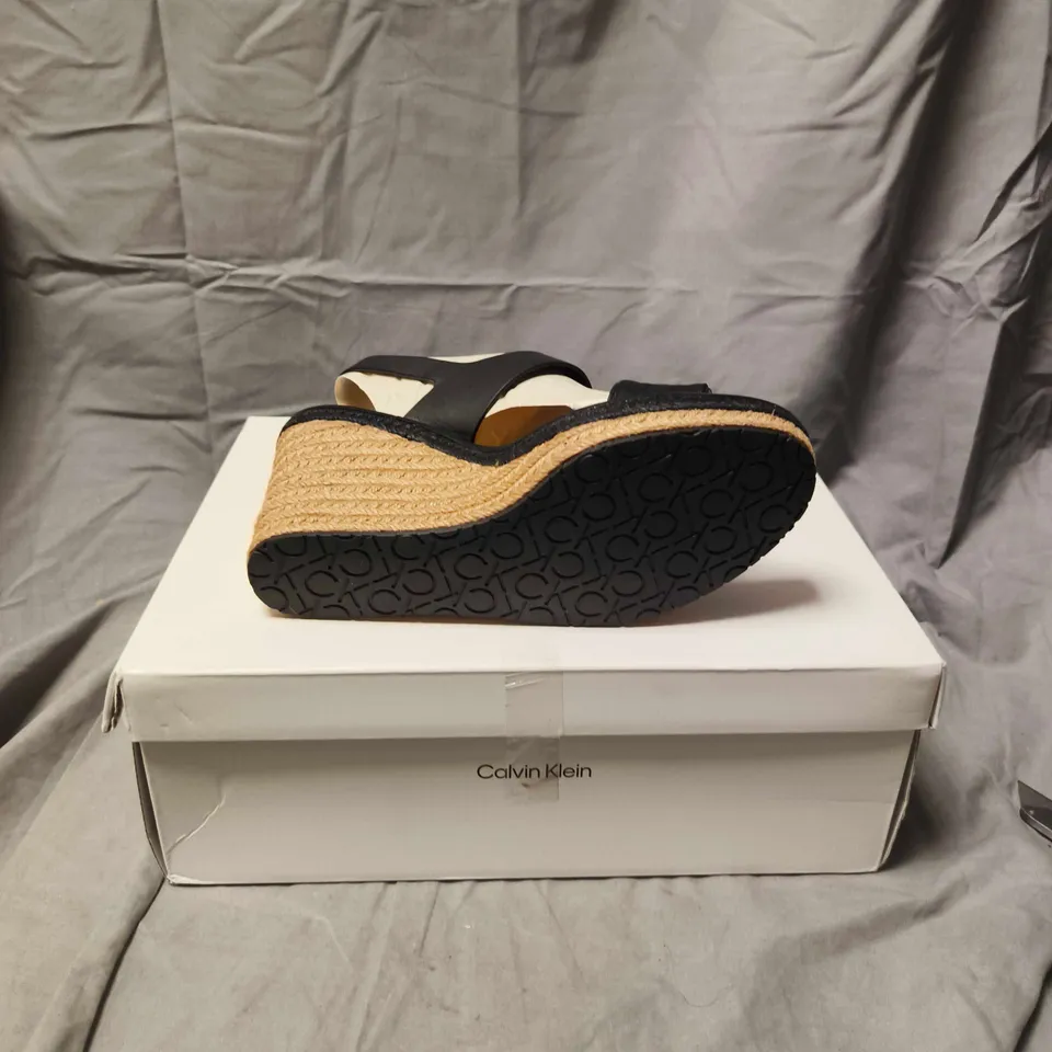 BOXED PAIR OF CALVIN KLEIN BLACK LEATHER WEDGE SANDALS – WOMEN'S SIZE 6 