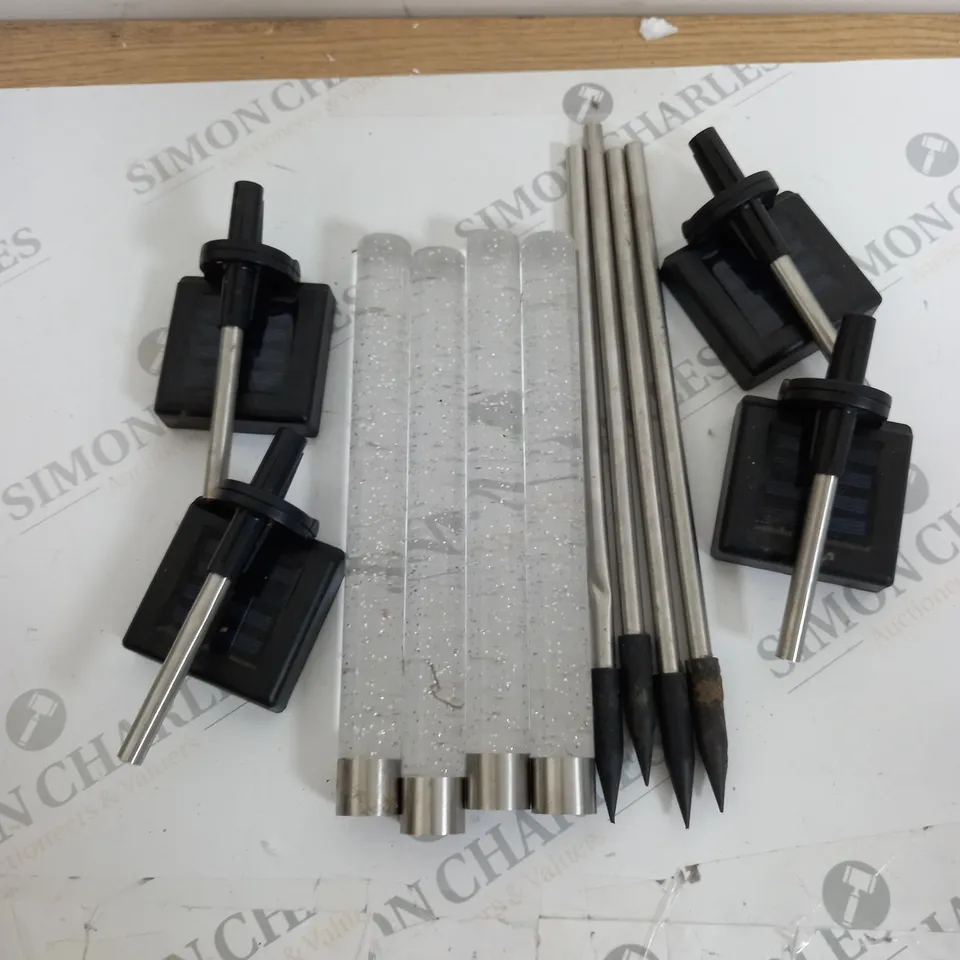 BOXED BELL & HOWELL GLIMMER STICKS SET OF 4 SOLAR PATHWAY LIGHTS
