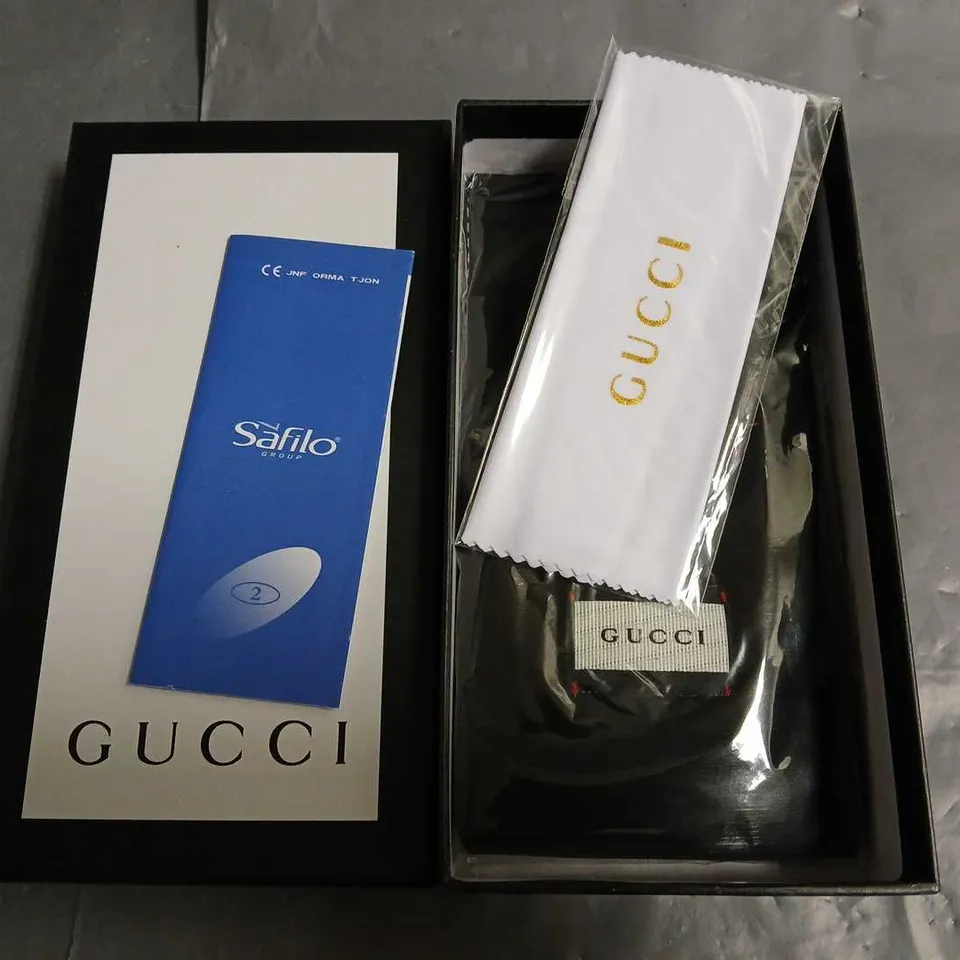 BOXED PAIR OF GUCCI GLASSES