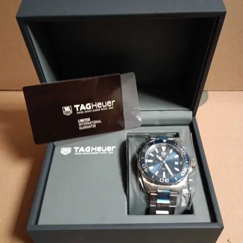 TAG HEUER STAINLESS STEEL WATCH WITH BLUE BEZEL 