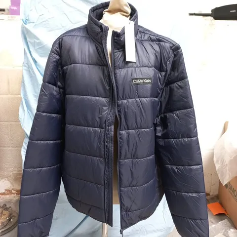 CALVIN KLEIN GOLF LONG SLEEVE PUFFER JACKET IN NAVY SIZE LARGE