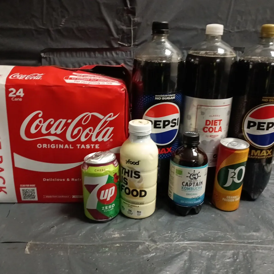LOT OF APPROXIMATELY 33 ASSORTED DRINK ITEMS TOP INCLUDE COCO COLA, PEPSI AND KUEL