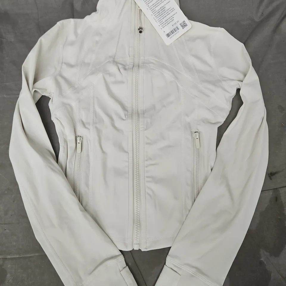 LULULEMON DEFINE CROPPED JACKET IN CREAM SIZE 4