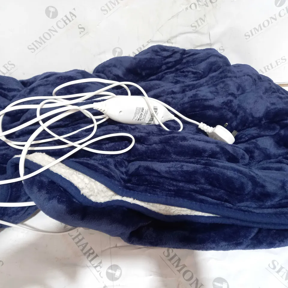 BOXED COZEE HOME VELVETSOFT & SHERPA HEATED WRAP IN NAVY