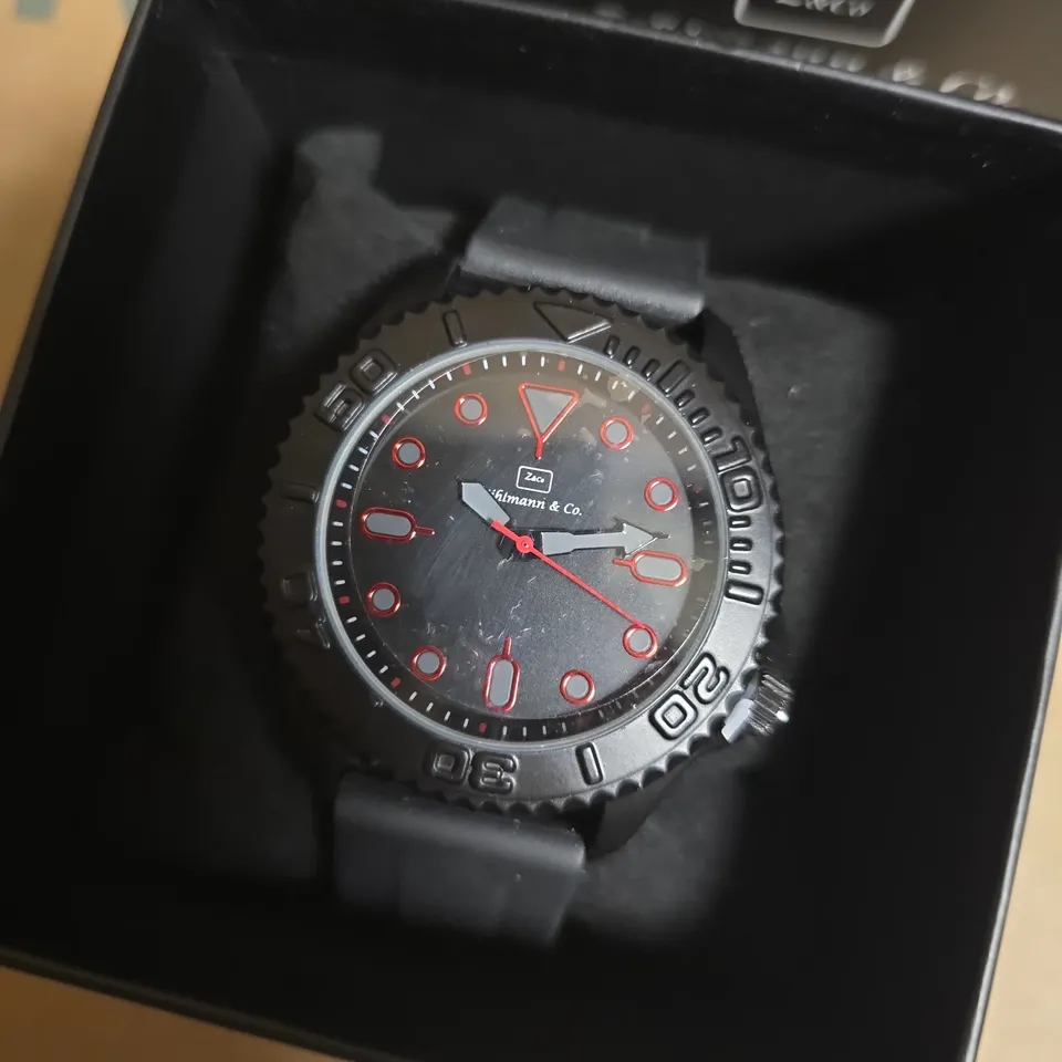 ZIHLMANN & CO STAINLESS STEEL WATCH WITH BLACK FACE & BLACK RUBBER STRAP