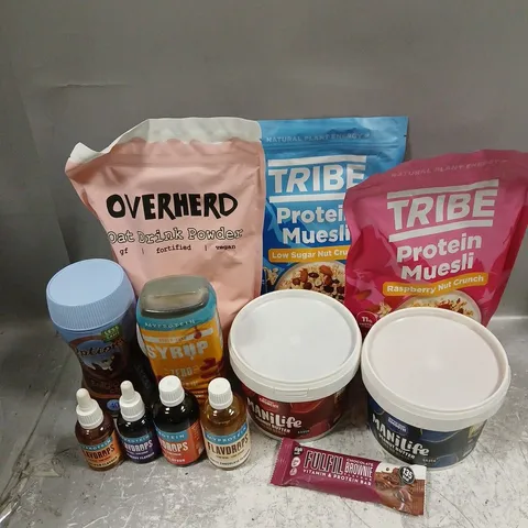 APPROXIMATELY 10 ASSORTED FOOD ITEMS TO INCLUDE - TRIBE PROTEIN MUESLI - MYPROTEIN FLAVDROPS - MANILIFE PEANUT BUTTER - ETC