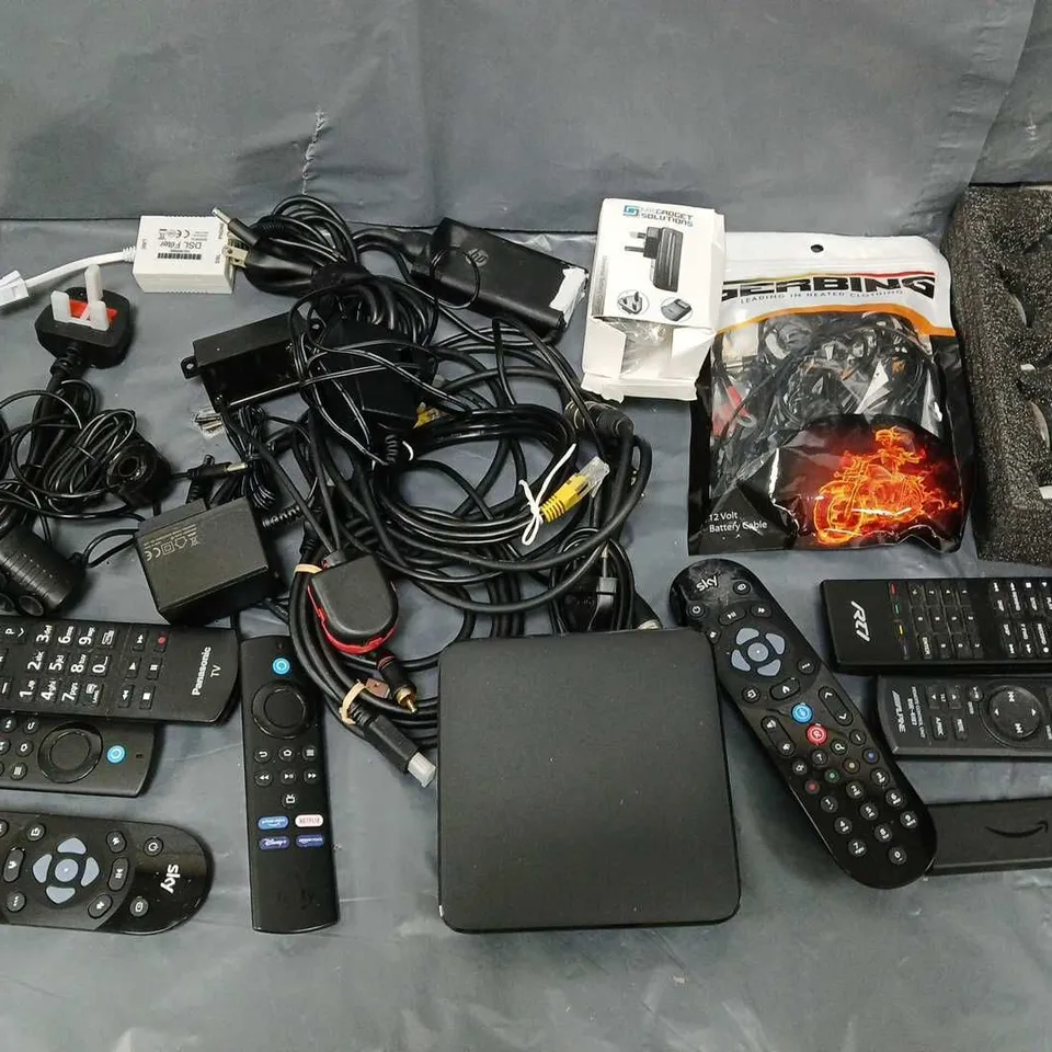 APPROXIMATELY 12 ASSORTED ITEMS TO INCLUDE - BATTERY CABLE, TV REMOTES, AND AMAZON FIRE STICK ETC. 