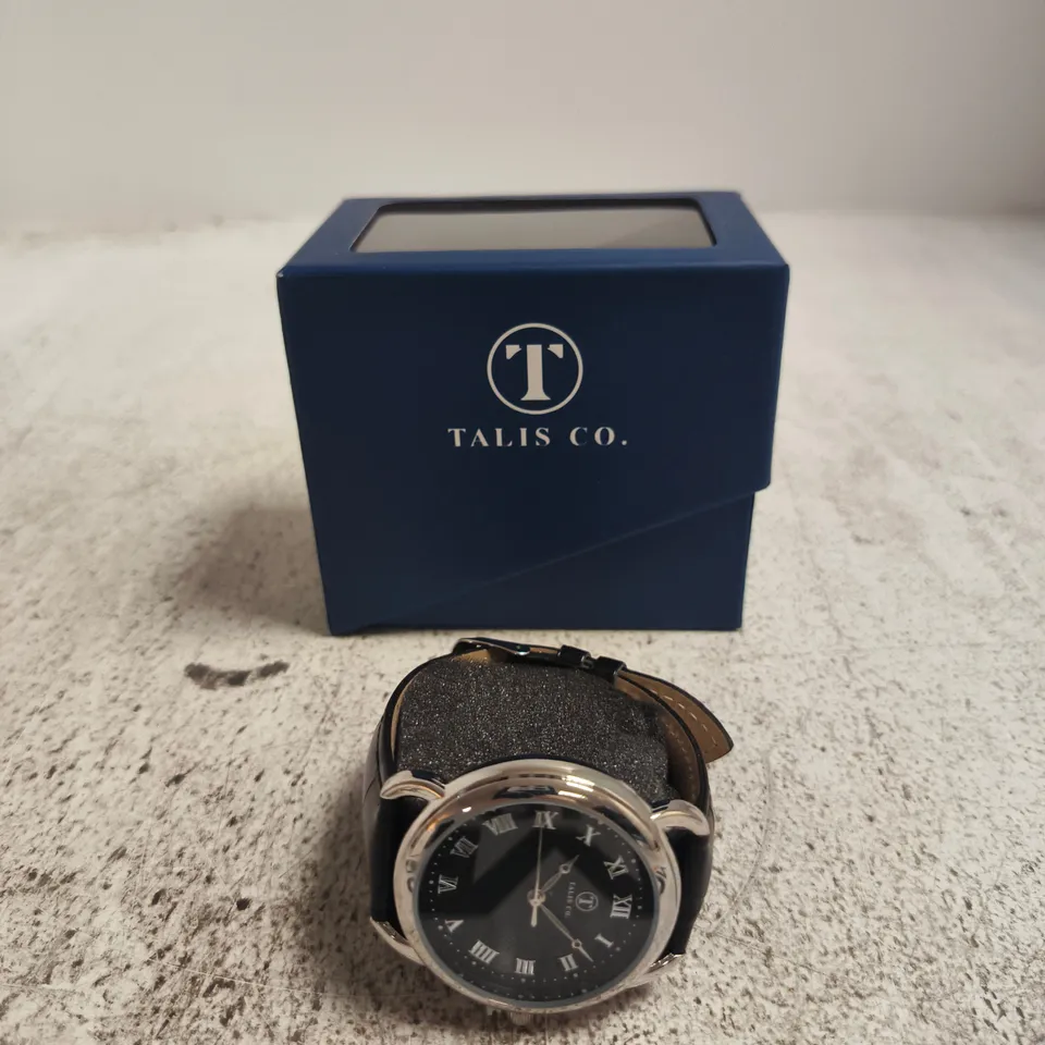 TALIS CO. WRISTWATCH - BLACK DIAL, ROMAN NUMERALS, LEATHER STRAP, IN BLUE DISPLAY BOX
