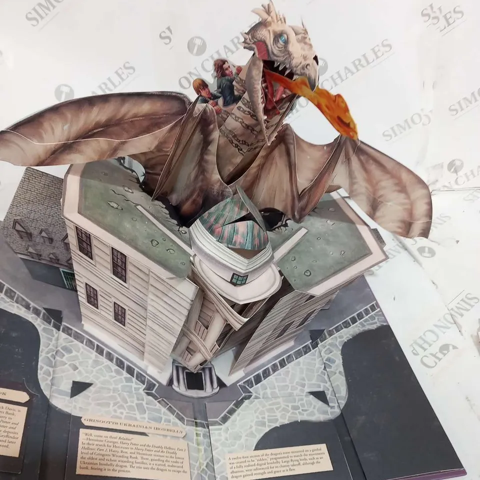 APPROXIMATELY 50 FROM THE FILMS OF HARRY POTTER A POP-UP GUIDE TO THE CREATURES OF THE WIZARDING WORLD 