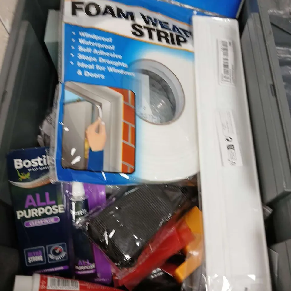 TOTE OF APPROXIMATELY 15 HOUSEHOLD ITEMS TO INCLUDE - WINDOW INSULATION KIT - MINI TOOL KIT - CURTAIN TIE BACKS