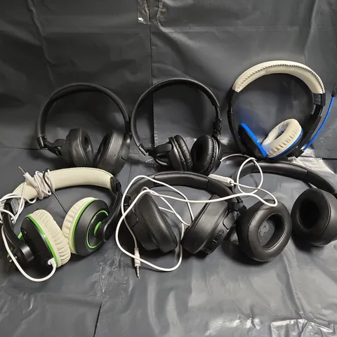 APPROXIMATELY 15 ASSORTED USED HEADPHONES TO INCLUDE BRANDS SUCH AS JBL, GIOTECK, ETC