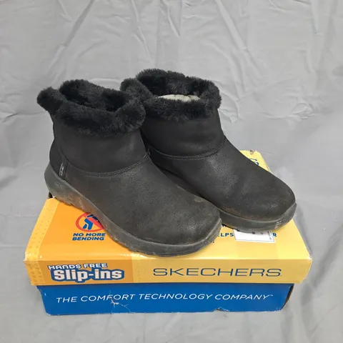 BOXED PAIR OF SKECHERS ON-THE-GO SLIP-IN BOOTS – BLACK, FUR-LINED - UK SIZED 5