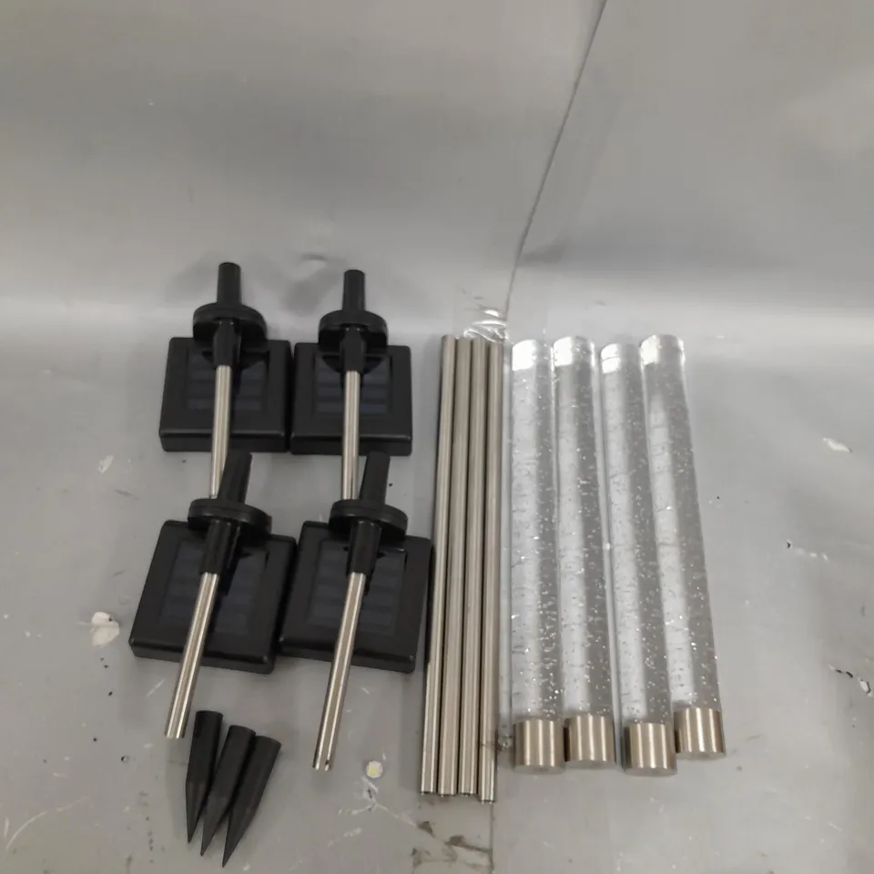 BOXED BELL & HOWELL GLIMMER STICKS SET OF 4 SOLAR PATHWAY LIGHTS