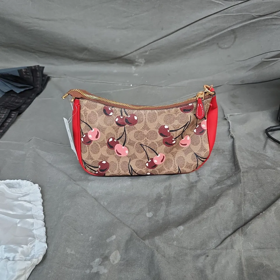 COACH CHERRY PRINT CROSSBODY BAG WITH RED LEATHER TRIM