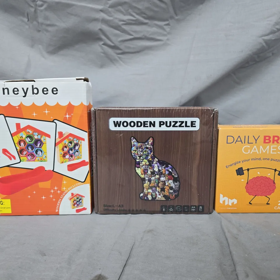 APPROXIMATELY 10 ASSORTED TOYS AND GAMES TO INCLUDE HONEYBEE, WOODEN PUZZLE, ETC