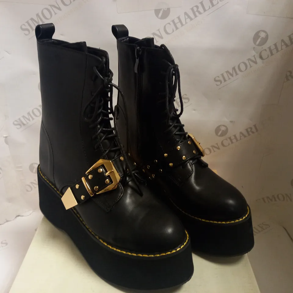 KOI VEGAN RIDDLER MEGA PLATFORM BUCKLE BOOTS - SIZE 5
