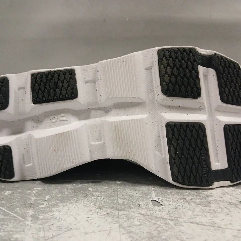 PAIR OF ON CLOUDMONSTER RUNNING SHOES IN WHITE/BLACK SIZE UK 8