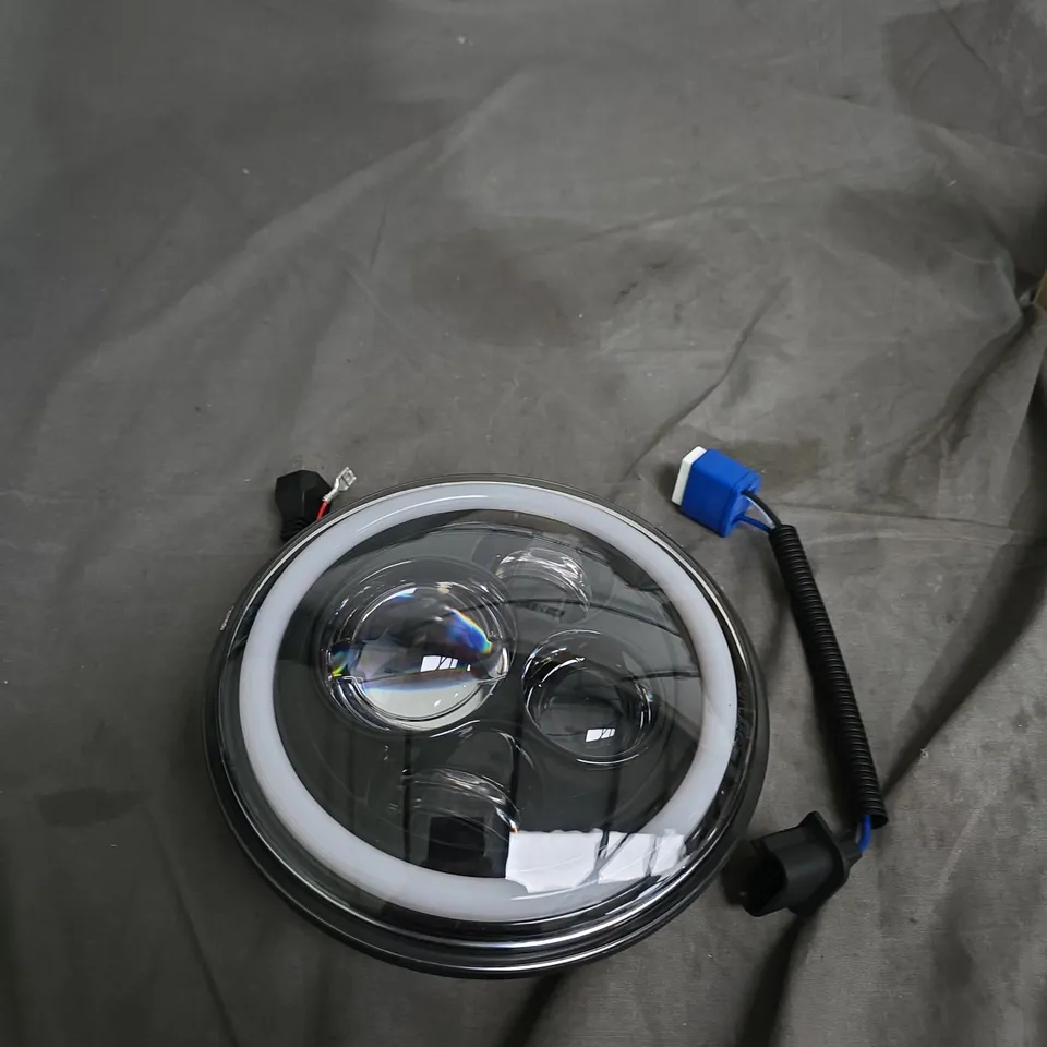 ROUND LED HEADLIGHT WITH HALO RING – VEHICLE PART .