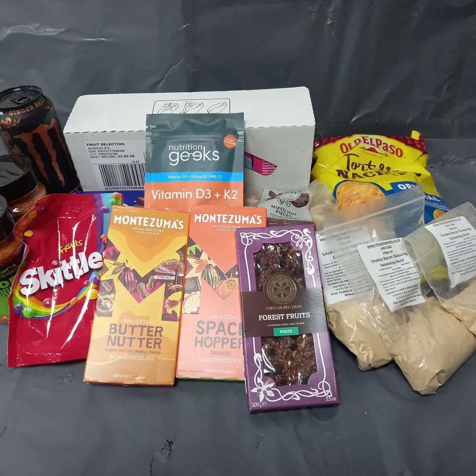 APPROXIMATELY 10 ASSORTED FOOD & DRINK ITEMS TO INCLUDE - SPICE WORKS SMOKY BACON SEASONING BLEND - MONTEZUMA'S CHOCOLATE - TRAEGER PORK & POULTRY APPLE & HONEY RUB - ETC 