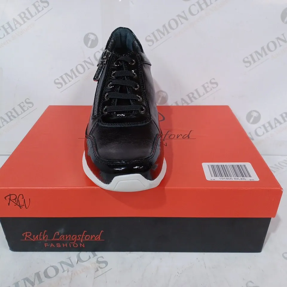 BOXED PAIR OF RUTH LANGSFORD WEDGE TRAINERS IN BLACK SIZE 5