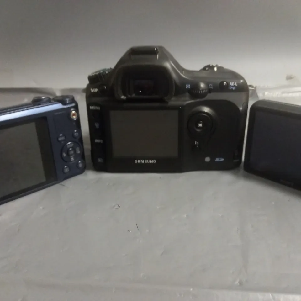 LOT OF 3 ASSORTED DIGITAL CAMERAS INCLUDES SAMSUNG GX 1S, SAMSUNG WB200F AND SONY CYBER SHOT