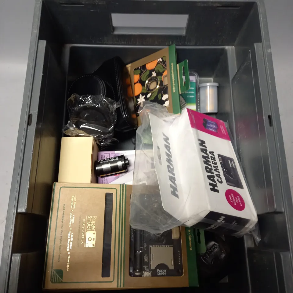 TOTE OF ASSORTED CAMERA ACCESSORIES TOO INCLUDE CAMERA CARRIER , STRAPS , INK , ETC 