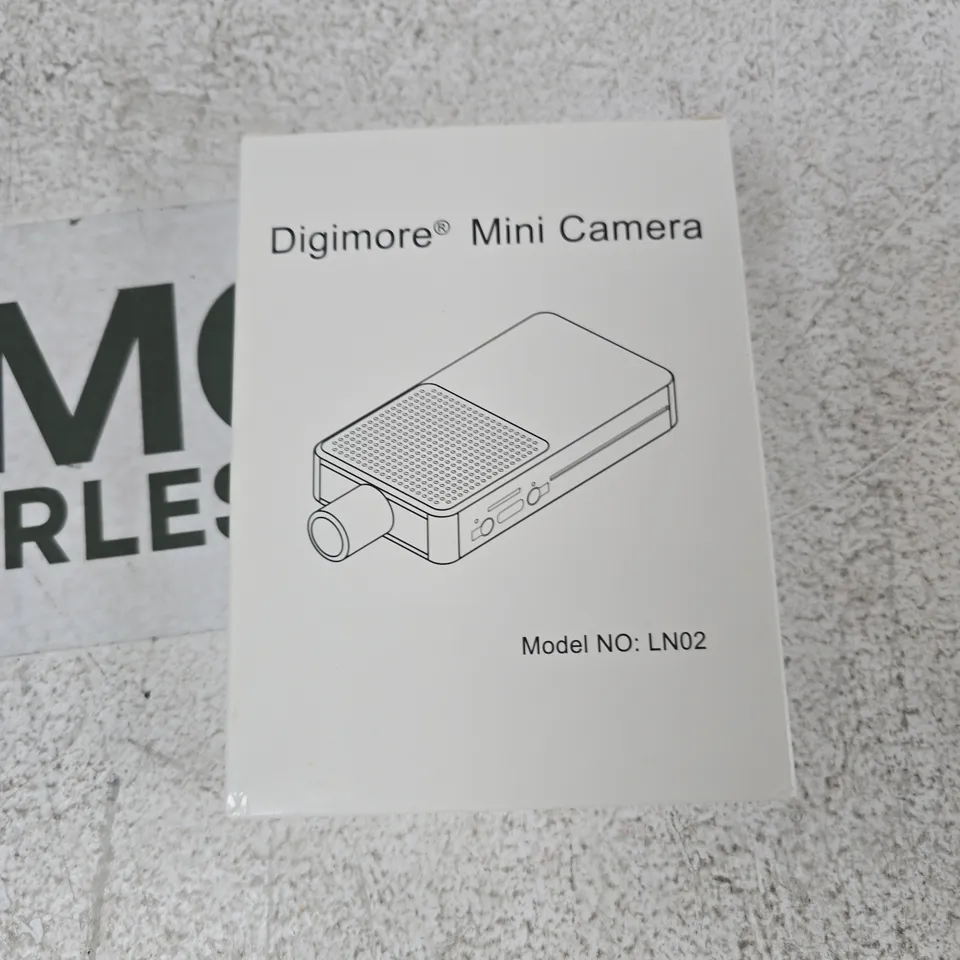 TOTE OF APPROXIMATELY 12 ASSORTED ITEMS TO INCLUDE: DIGIMORE MINI CAMERA