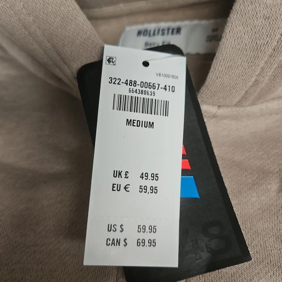 HOLLISTER NASCAR BOXY FIT HOODIE JACKET – BEIGE, MEDIUM