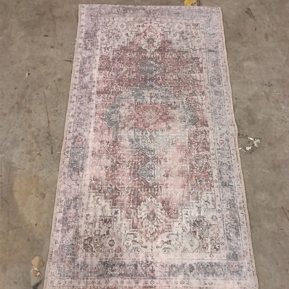 STILLAGE CONTAINING DESIGNER AREA RUGS APPROXIMATELY 15 RUGS 