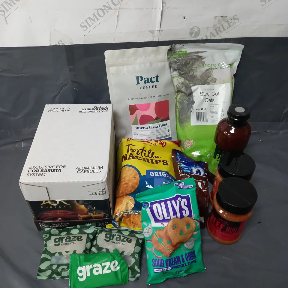 APPROXIMATELY 10 ASSORTED FOOD & DRINK ITEMS TO INCLUDE - LOR ALUMINUM CAPSULES - TRAEGER SWEET & HEAT BBQ SAUCE - CHOCOLATE M&MS - ETC
