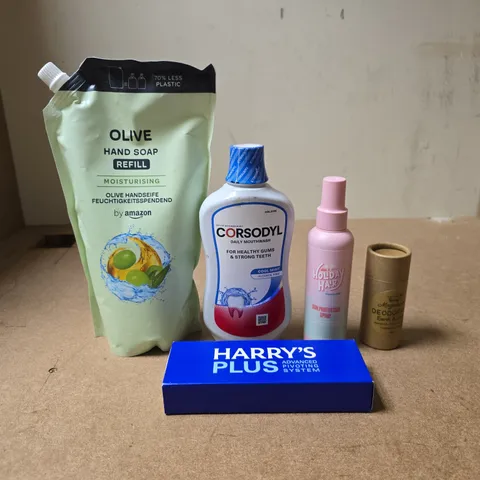 TOTE OF APPROXIMATELY 15 ASSORTED COSMETIC ITEMS TO INCLUDE OLIVE HAND SOAP REFILL, CORSODYL, HARRYS PLUS, HOLIDAY HAIR, EARTH AND CALM DEODORANT ETC
