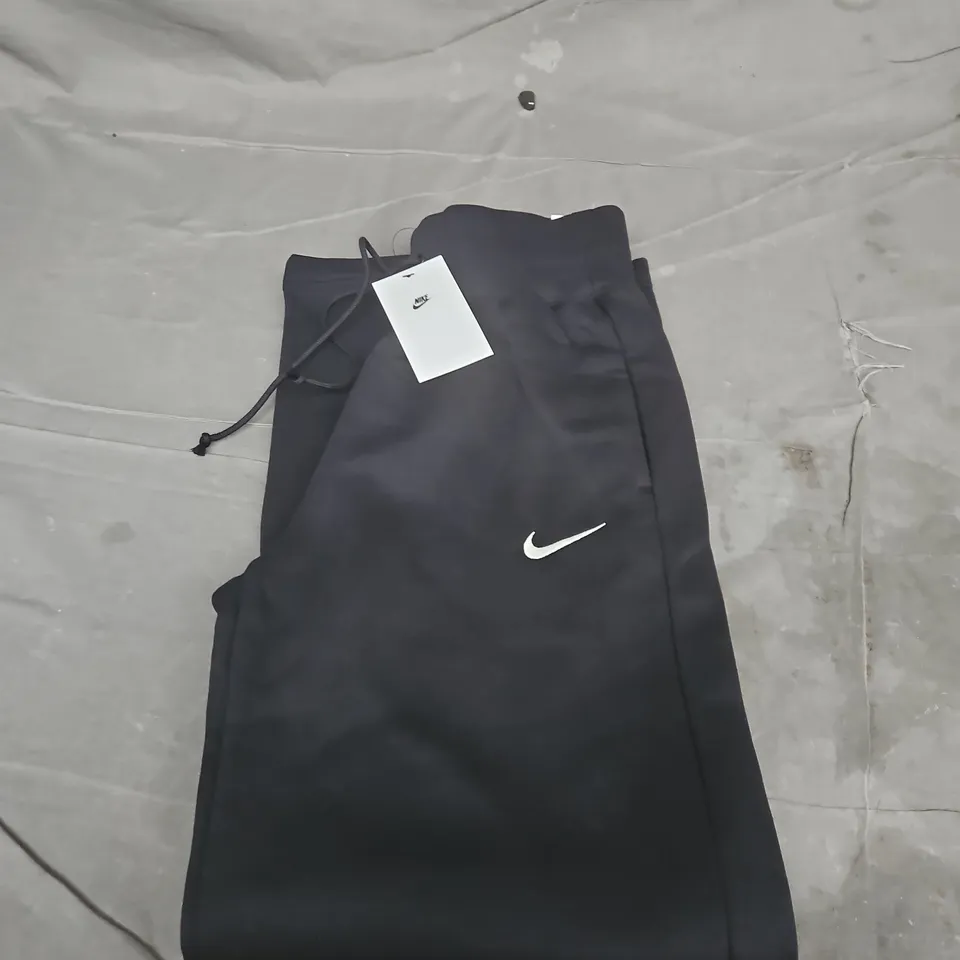 NIKE BLACK JOGGERS WITH WHITE SWOOSH – WOMENS - XS