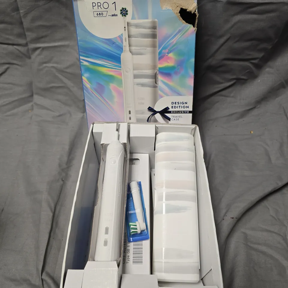 BOXED ORAL-B PRO 1 680 ELECTRIC TOOTHBRUSH  