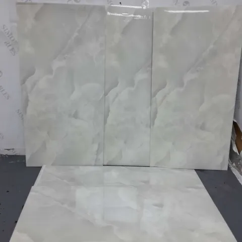 APPROXIMATELY 10 FAUX MARBLE WALL DECOR PIECES