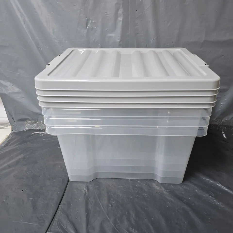 4 SMALL CLEAR STORAGE TUBS WITH GREY LIDS
