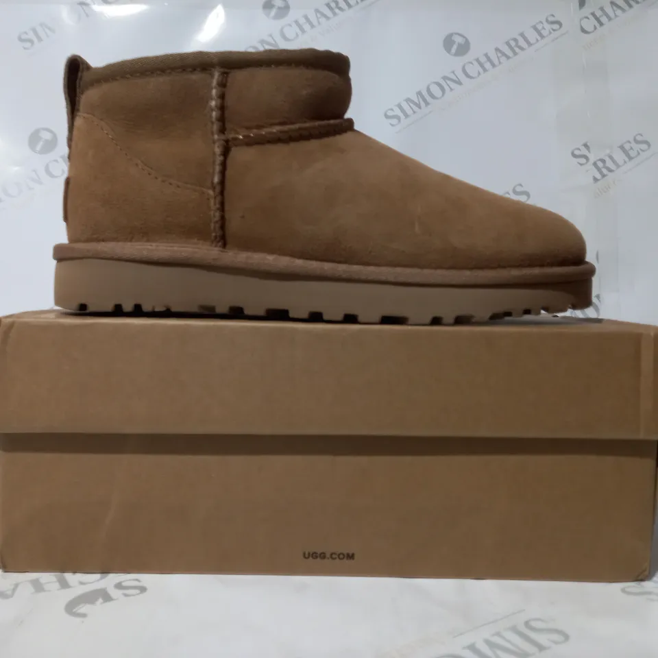 BOXED PAIR OF UGG CLASSIC ULTRA MINI SHOES IN TAN UK SIZE 4