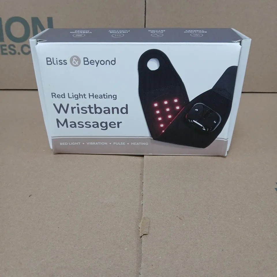 BLISS AND BEYOND RED LIGHT HEATING WRISTBAND MASSAGER BOXED