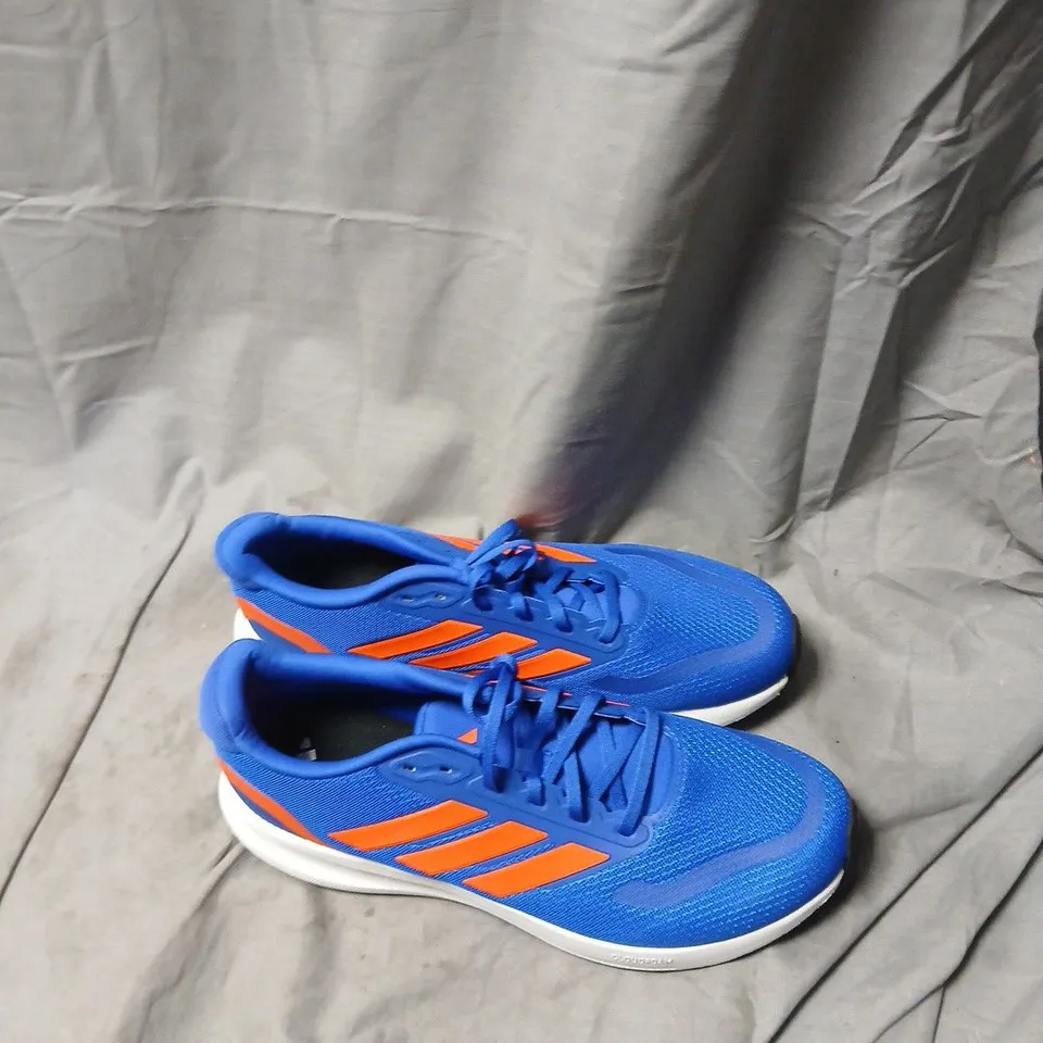 BLUE RUNNING SHOES WITH ORANGE STRIPES (MEN'S) UK SIZE 10.5 ADIDAS .