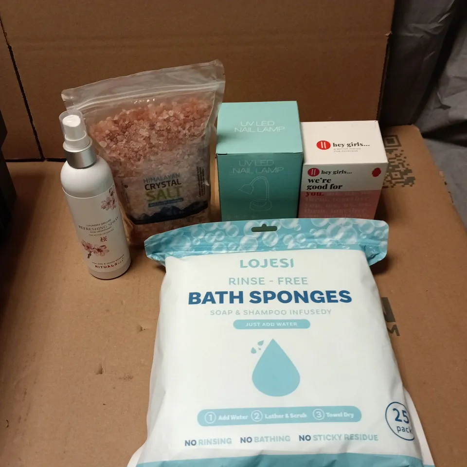 APPROXIMATELY 15 HEALTH AND BEAUTY PRODUCTS TO INCLUDE HIMALAYAN CRYSTAL SALTS, RINSE FREE BATH SPONGES AND UV LED NAIL LAMP