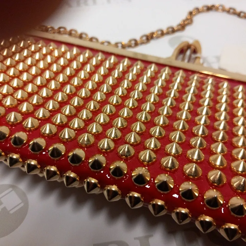 CHRISTIAN LOUBOUTIN RED AND GOLD CLUTCH BAG