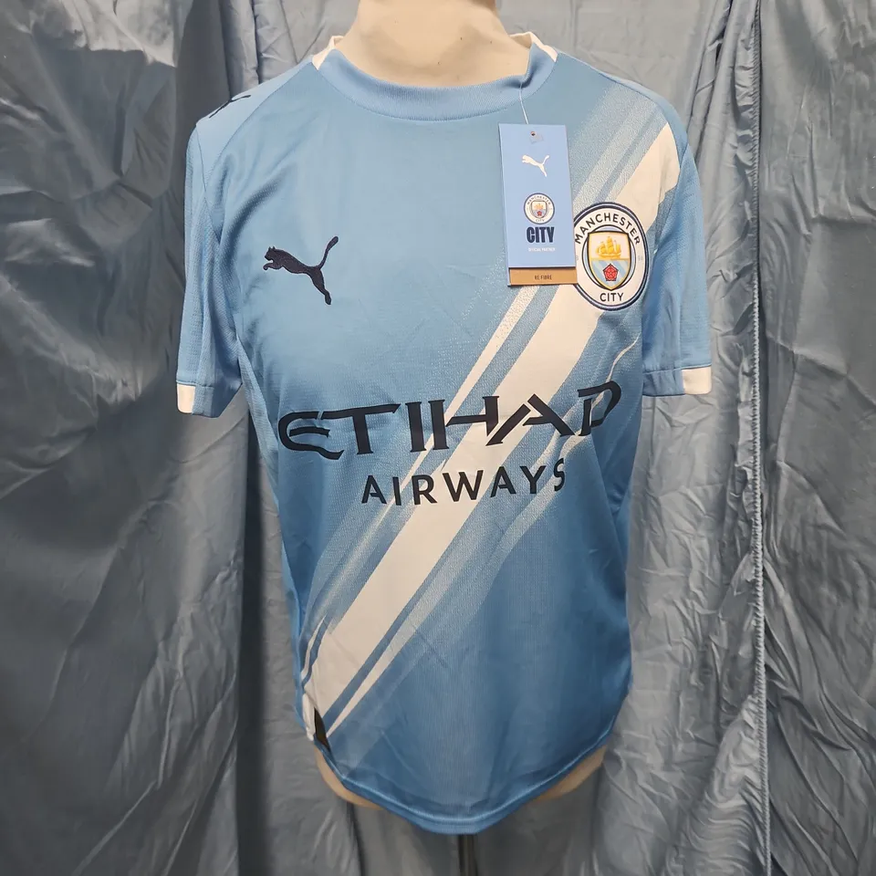 MCFC HOME JERSEY REPLICA IN LIGHT BLUE - UK 13/14 YRS JUNIOUR