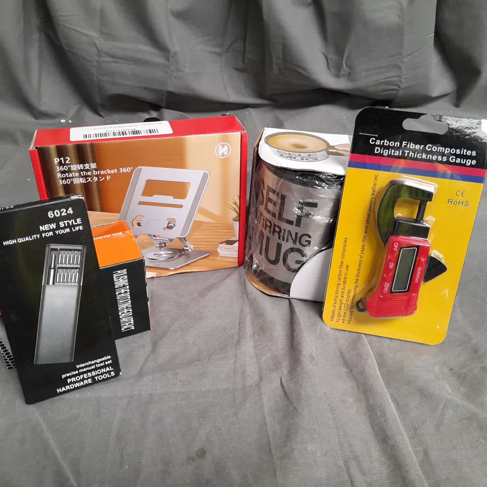APPROX 25 ASSORTED HOUSEHOLD ITEMS TO INCLUDE SELF STIRRING MUG DIGITAL THICKNESS GAUGE INTERCHANGEABLE TOOL SET, DRILL BIT GRINDER, ETC. 