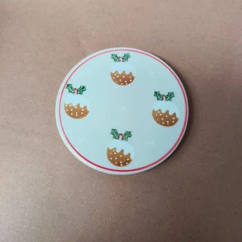 APPROXIMATELY 12 GISELA GRAHAM CHRISTMAS PUDDING STONEWARE COASTER WITH A CREAM GLAZE